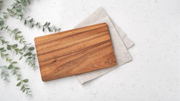 A bit of salt or lemon can disinfect wooden cutting boards so that they smell fresh and clean. (everydayplus/Shutterstock)