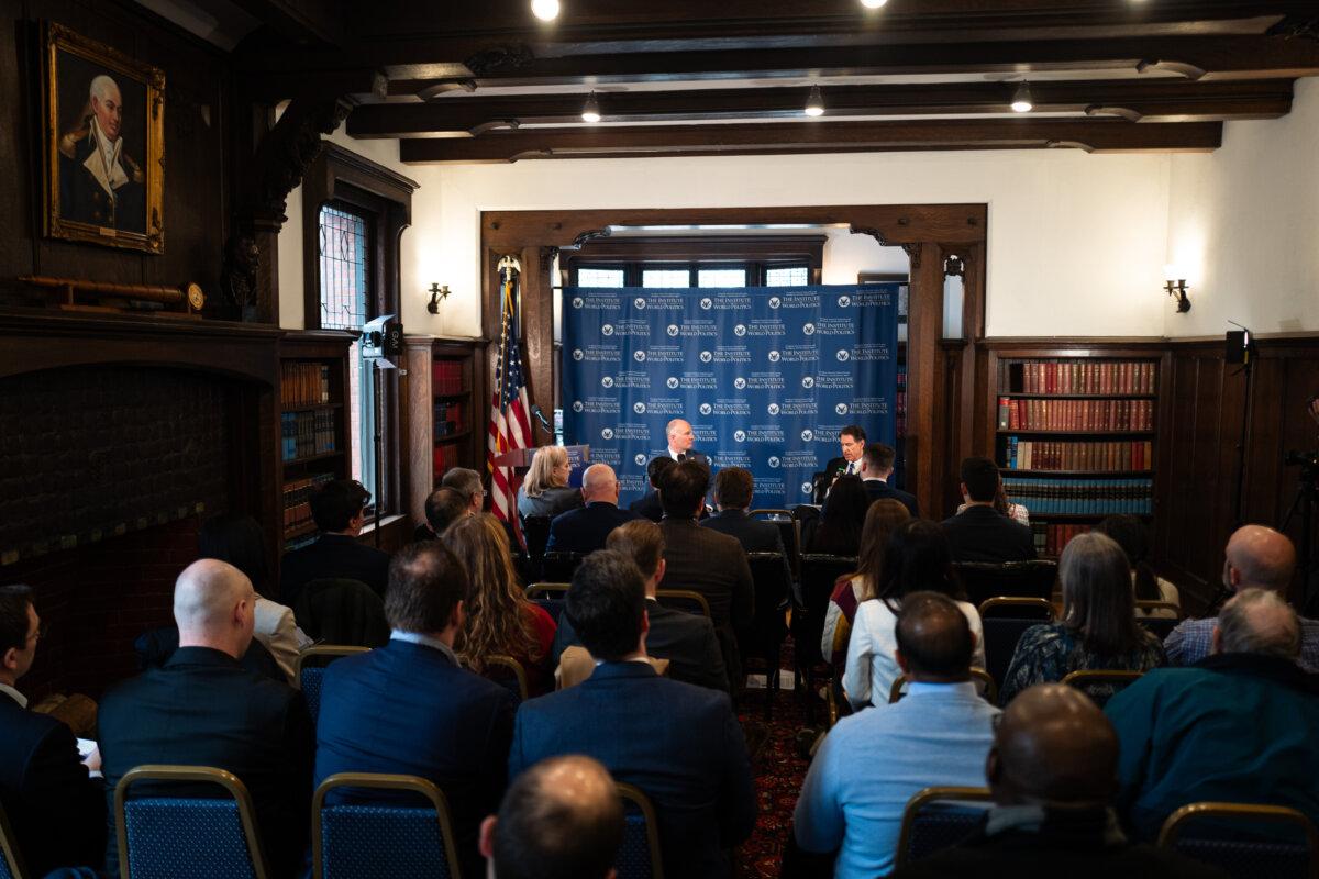 Chairman of the House Select Committee on the Chinese Communist Party (CCP) Rep. John Moolenaar (R-Mich.) (L), and founder, president emeritus, and chancellor of The Institute of World Politics, John Lenczowski (R) speak during an event in Washington on Feb. 11, 2025. (Madalina Vasiliu/The Epoch Times)