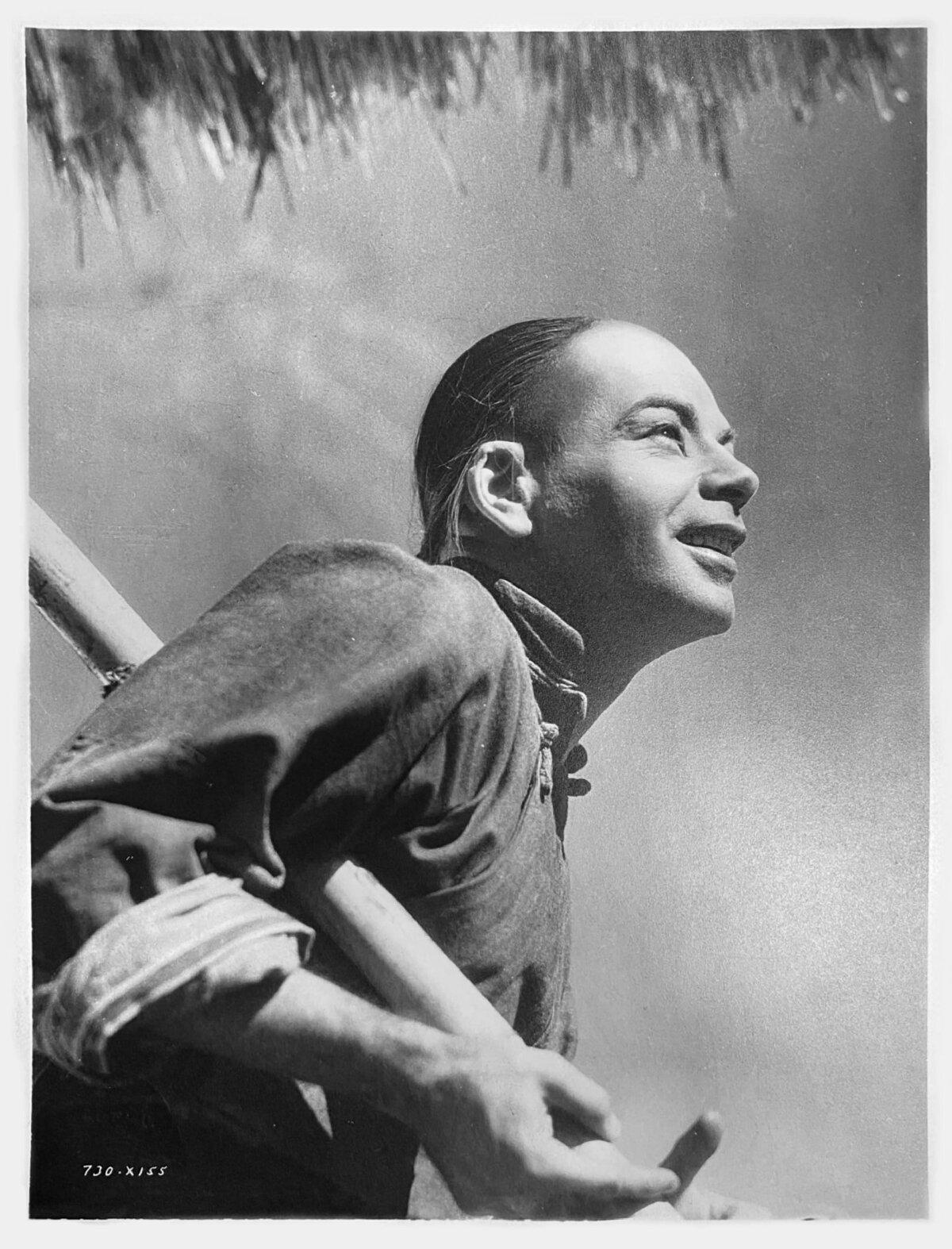 Wang (Paul Muni) tills the earth and becomes prosperous, in "The Good Earth." (MGM/MovieStillsDB)