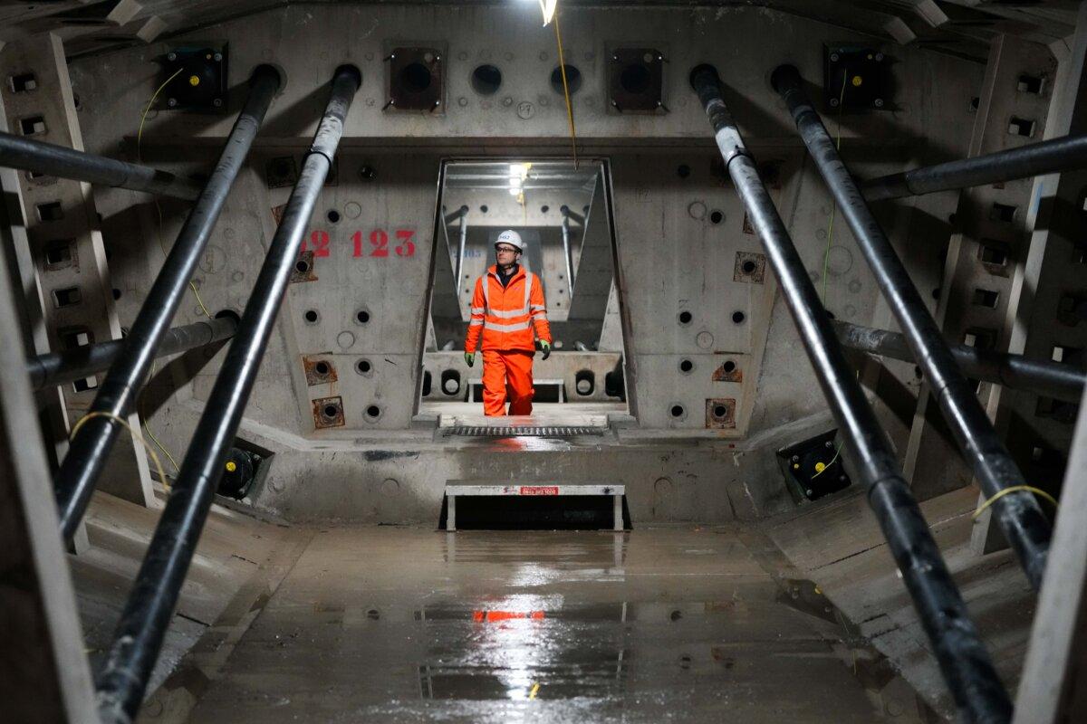 Engineers work inside the access void below the deck of the HS2 viaduct at the Delta Junction construction site in Sutton Coldfield, England, on Feb. 12, 2025. (Christopher Furlong/Getty Images)