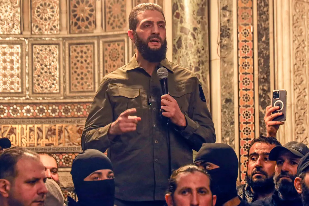 Ahmed al-Sharaa, also known by the nom de guerre Abu Mohammed al-Golani, speaks at the Umayyad Mosque in Damascus, Syria, on Dec. 8, 2024. (The Canadian Press/AP/Omar Albam)
