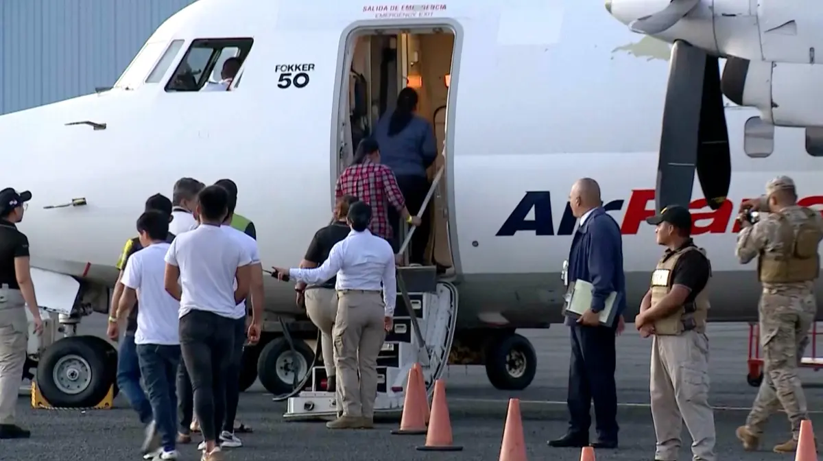 People board a deportation flight from Panama funded by the United States, in Panama City, Panama, on Feb. 13, 2025. (Telemetro via AP/Screenshot via The Epoch Times)