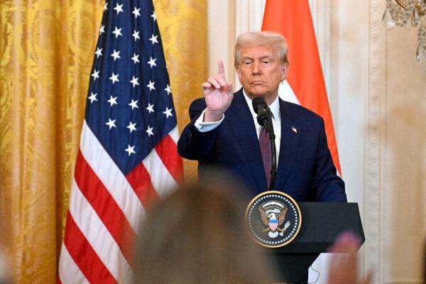 U.S. President Donald Trump takes questions during a joint press conference with Indian Prime Minister Narendra Modi, in the East Room of the White House in Washington, on Feb. 13, 2025. (Jim Watson/AFP via Getty Images)