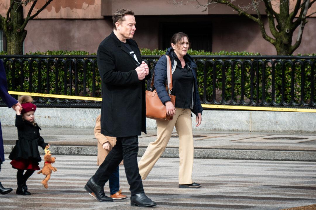 Federal Employees Sue Over OPM Missive, Musk Termination Threat