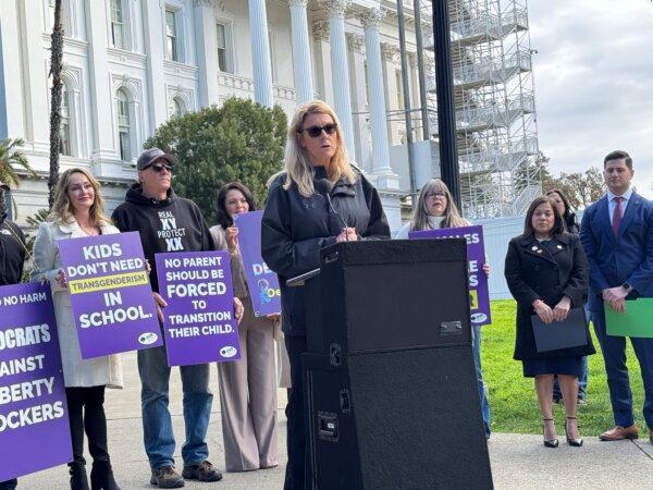 Melissa Batie-Smoose, former assistant coach of the Spartans Women’s Volleyball team at San Jose State University who was fired for joining the Title IX lawsuit against the NCAA and Mountain West Conference, speaks at a press conference outside California’s state Capitol Building in Sacramento on Feb. 14, 2025. (Courtesy Greg Burt/California Family Council)