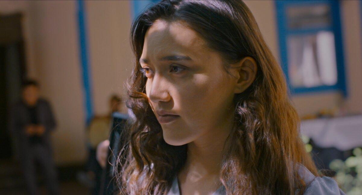Dilber (Guzalnur Uchqun) is an unmarried Uyghur, in “Nikah.” (Icarus Films)