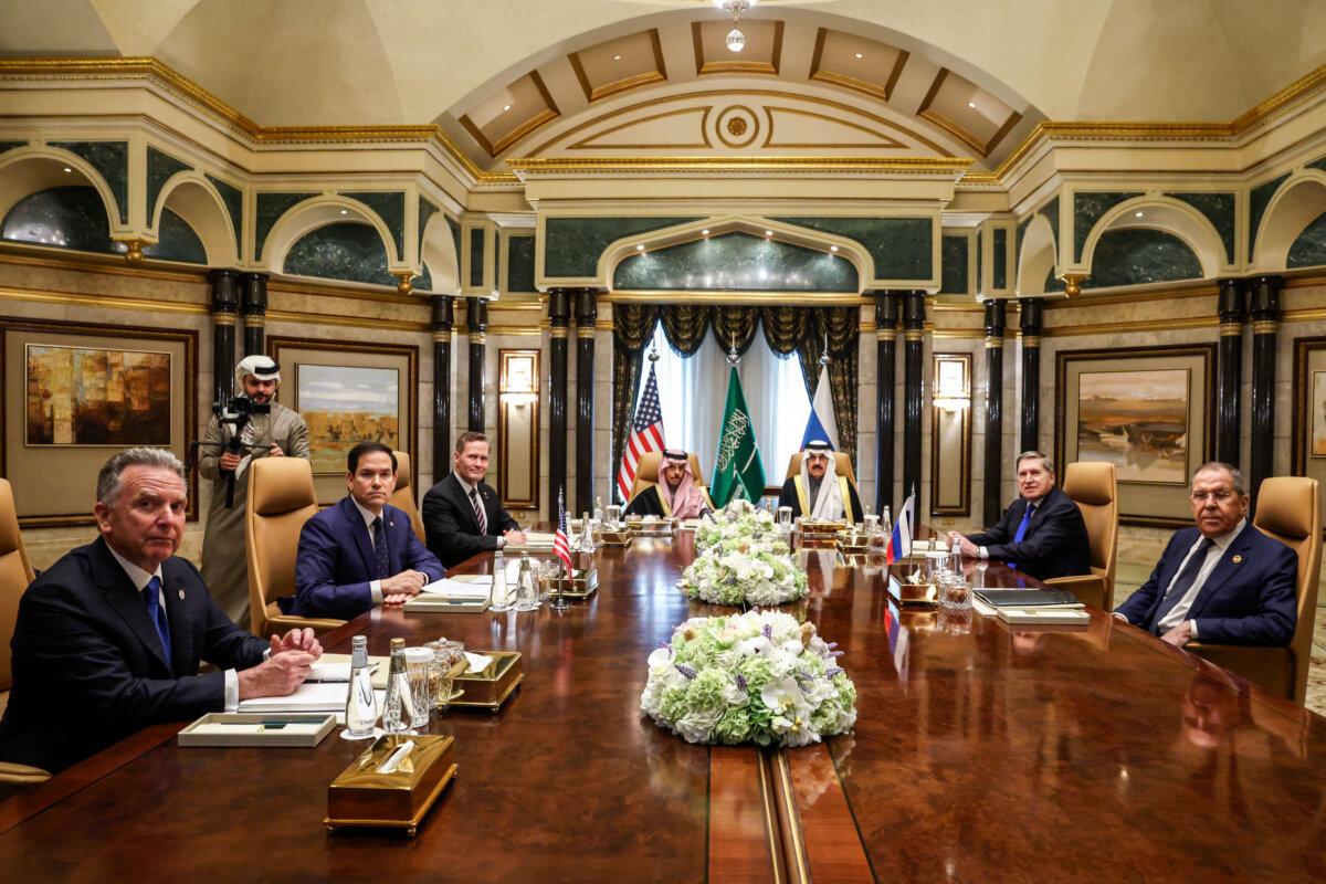 Russians React to Trump’s Peace Overtures With Cautious Optimism | USNN World News (L–R) U.S. Middle East envoy Steve Witkoff, Secretary of State Marco Rubio, national security adviser Mike Waltz, Saudi Arabia's Foreign Minister Prince Faisal bin Farhan al-Saud, national security adviser Mosaad bin Mohammad al-Aiban, the Russian president's foreign policy advisor Yuri Ushakov, and Russia's Foreign Minister Sergei Lavrov attend a meeting at Riyadh's Diriyah Palace on Feb. 18, 2025. (Evelyn Hockstein/AFP via Getty Images)