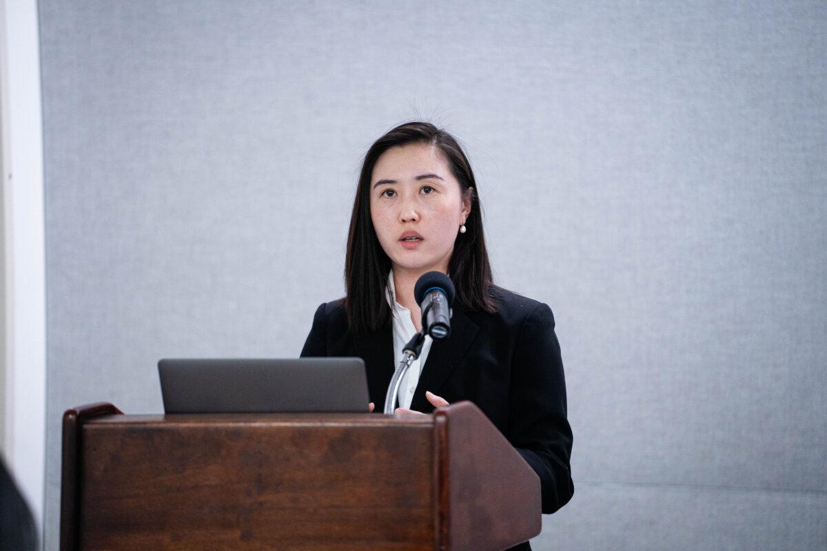 Shen Yun Performing Arts percussionist Alice Liu speaks during a press conference over the recent fake bomb threat targeting the company at the John F. Kennedy Center for the Performing Arts, at the National Press Club in Washington on Feb. 21, 2025. (Madalina Vasiliu/The Epoch Times)