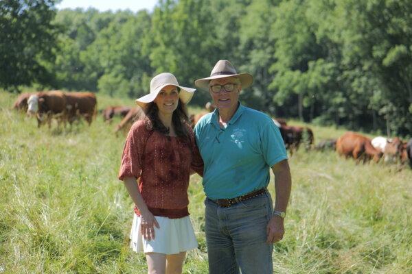 Sina McCullough and Joel Salatin at Polyface Farm. (Nolan Gunn)