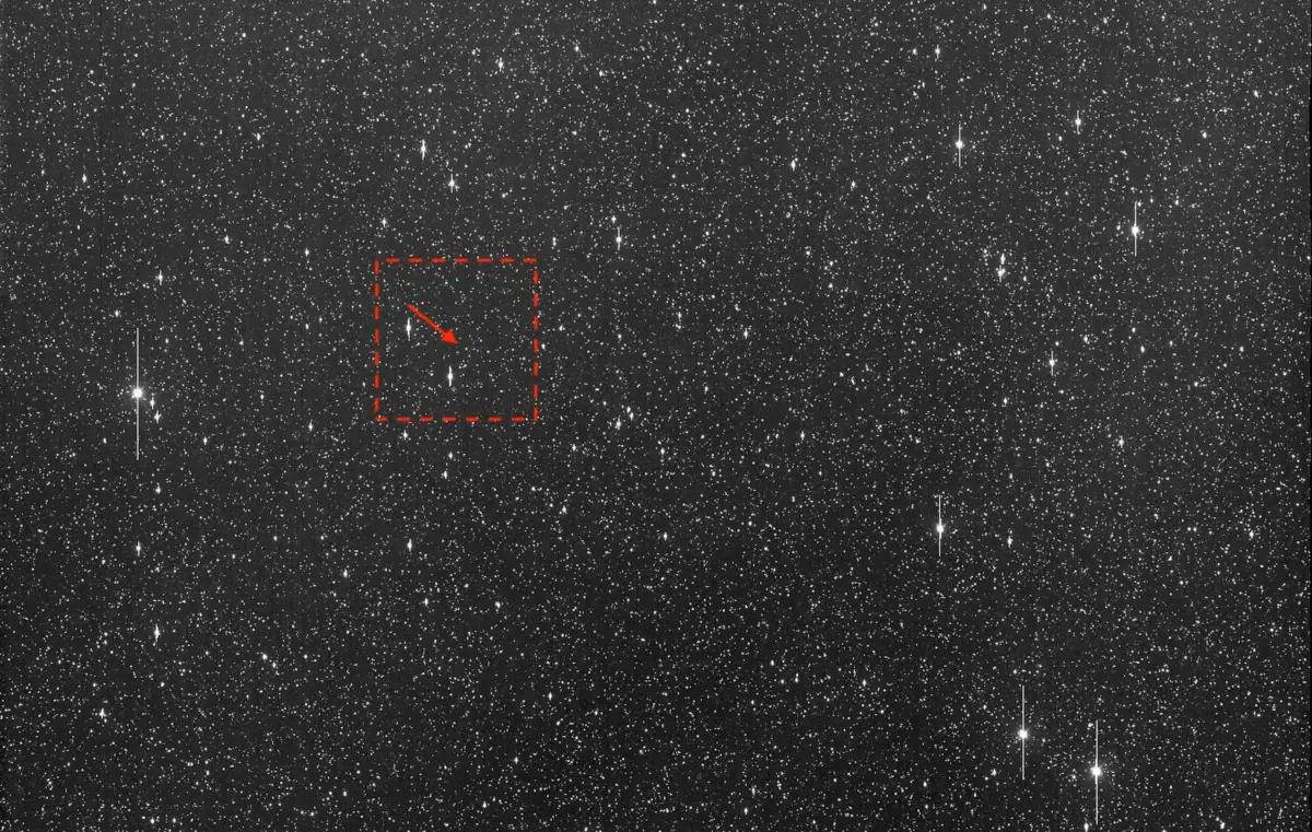 An arrow where asteroid 2024 YR4 would be, on Dec. 27, 2024. (ATLAS/University of Hawaii/NASA via AP)