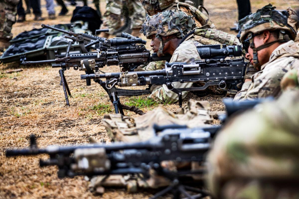 U.S. troops take part in weapons training during the 'Balikatan' or 'shoulder-to-shoulder' U.S.-Philippines joint military exercises in Fort Magsaysay in Nueva Ecija, Philippines, on April 13, 2023. (Ezra Acayan/Getty Images)