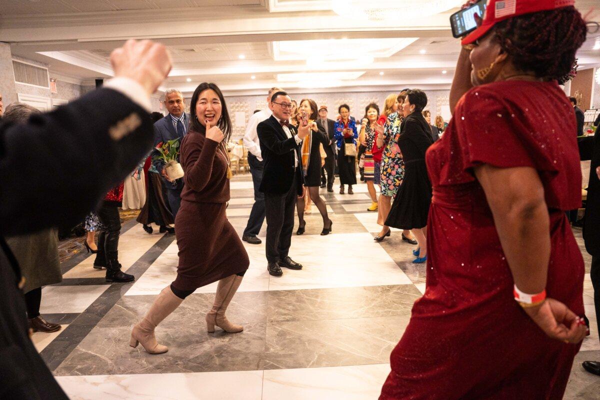 People dance at the Queens Village Republican Club’s 150th Anniversary Lincoln Dinner in Queens Village, N.Y., on March 2, 2025. (Samira Bouaou/The Epoch Times)