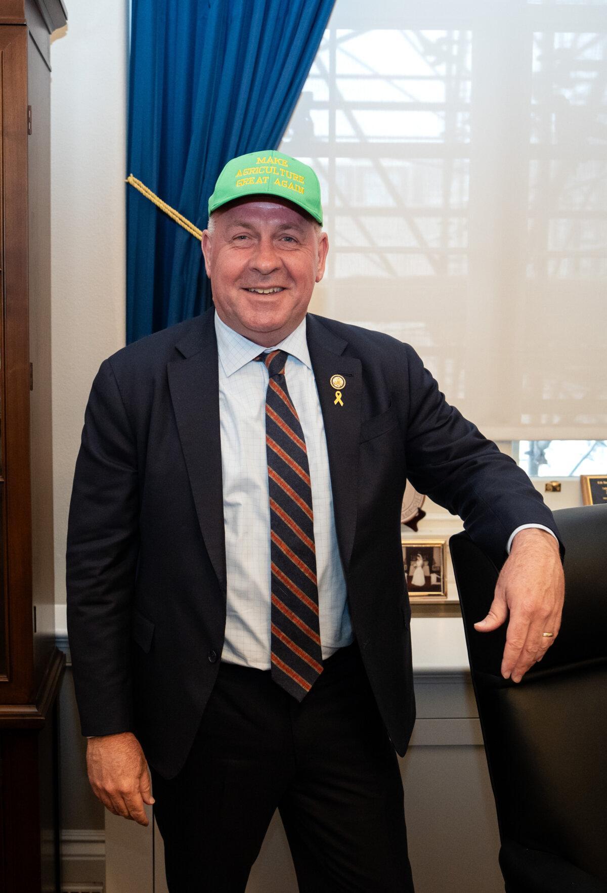 Rep. Dave Taylor (R-Ohio) wears a Make Agriculture Great Again hat in his office on Capitol Hill in Washington on March 6, 2025. (Madalina Vasiliu/The Epoch Times)