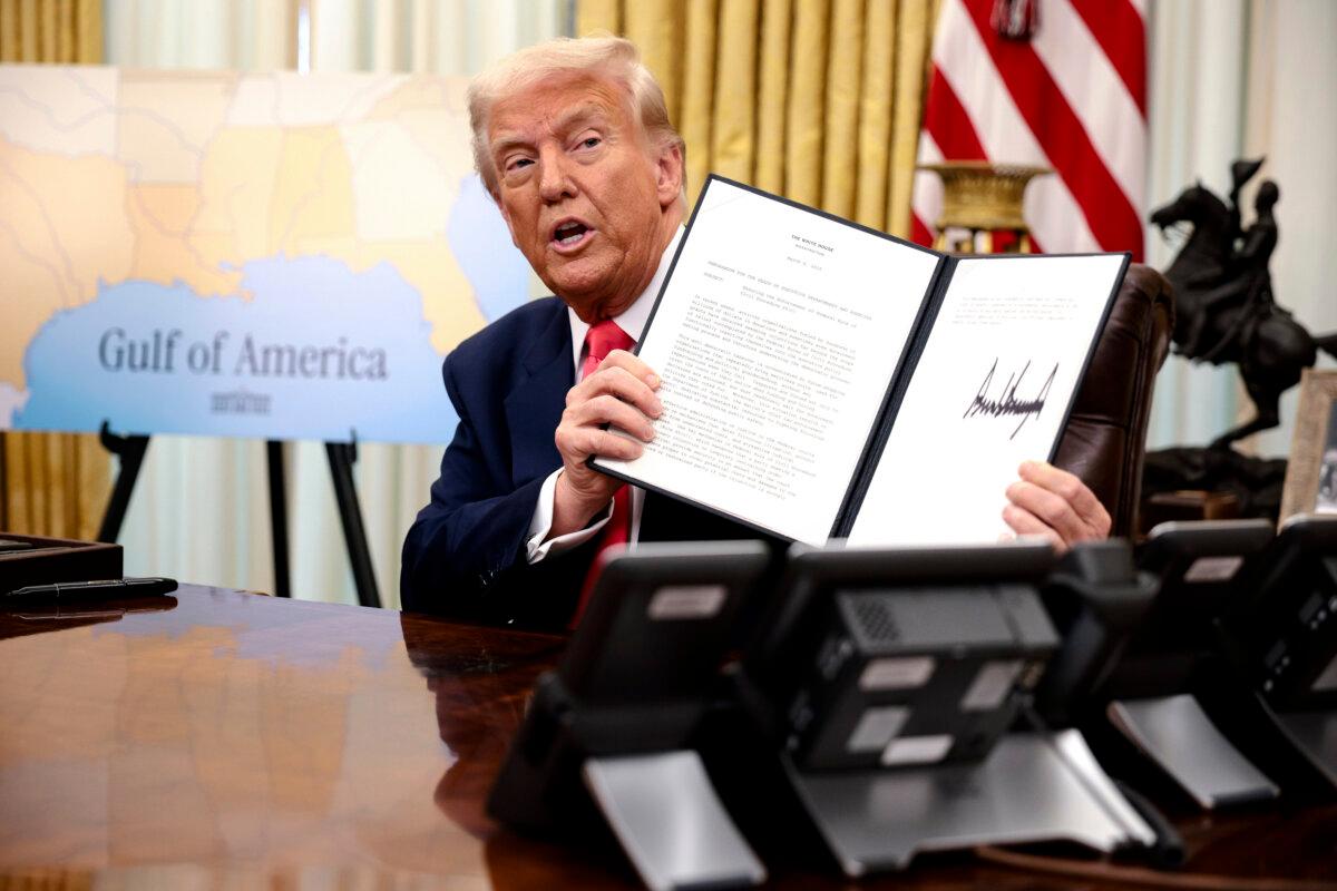 President Donald Trump signs executive orders in the Oval Office of the White House on March 6, 2025. (Alex Wong/Getty Images)