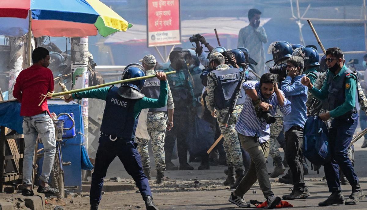 Bangladeshi police personnel baton-charge to disperse members of banned Islamist group Hizb ut-Tahrir during a rally in Dhaka, Bangladesh, on March 7, 2025. (Munir Uz Zaman/AFP via Getty Images)
