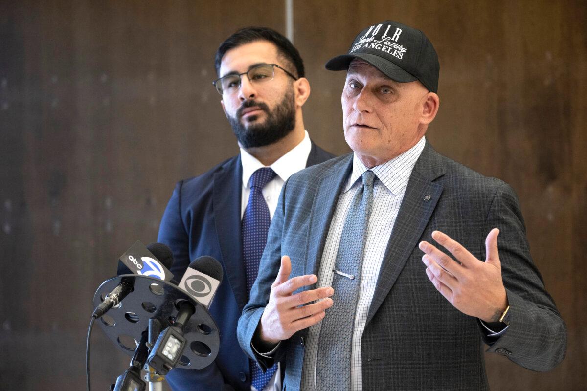 Ferguson's attorney Cameron Talley (R) talks to the media as co-counsel Kaveh Newmen listens in Santa Ana, Calif., on March 10, 2025. (Mindy Schauer/The Orange County Register via AP)