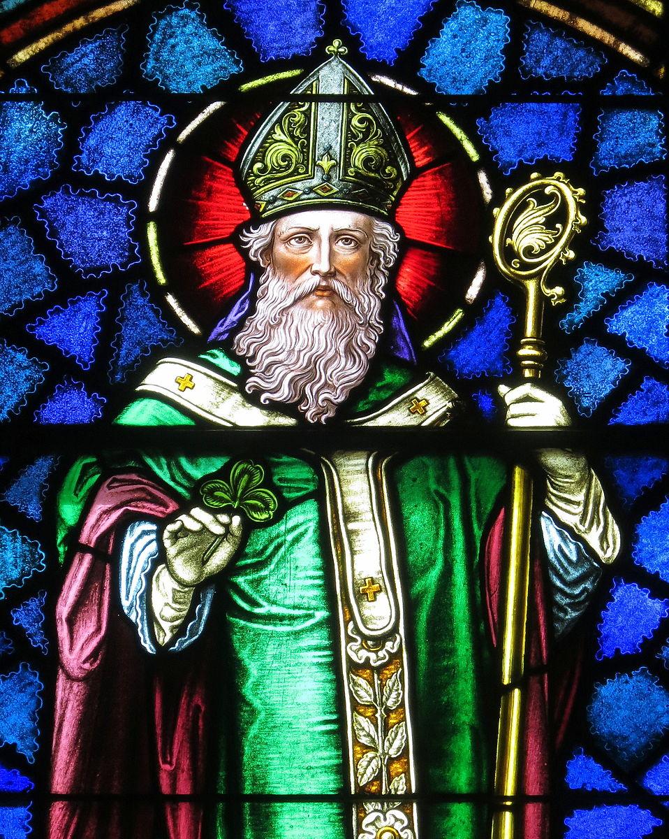 A stained glass window of St. Patrick shines brightly, in St. Patrick Catholic Church in Junction City, Ohio. (<a href="https://commons.wikimedia.org/wiki/User:Nheyob">Nheyob</a>/<a href="https://creativecommons.org/licenses/by-sa/4.0/deed.en">CC BY-SA 4.0</a>)