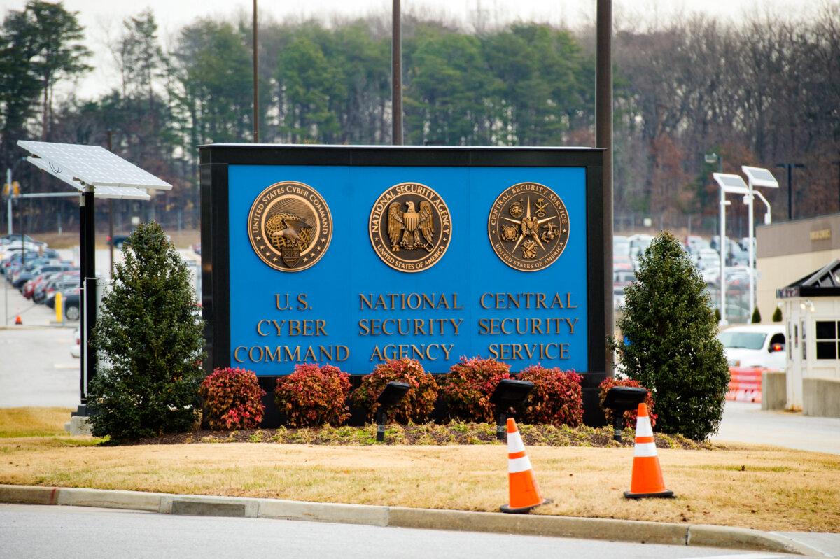 A sign for the National Security Agency, U.S. Cyber Command, and Central Security Service near the visitor's entrance to the headquarters of the National Security Agency in Fort Meade, Md., on Feb. 14, 2018. (Saul Loeb/AFP via Getty Images)