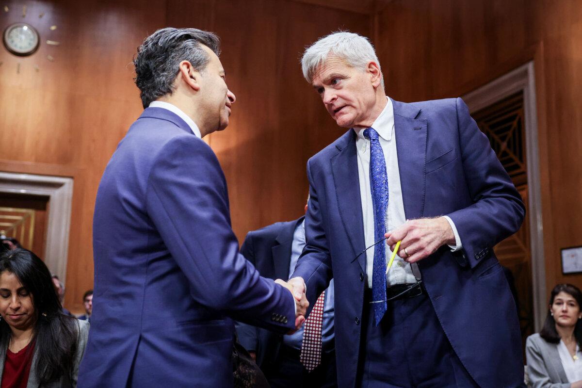 Dr. Marty Makary (L), President Donald Trump's nominee to lead the Food and Drug Administration, greets Sen. Bill Cassidy (R-La.) as he arrives to testify during his confirmation hearing before the Senate Committee on Health, Education, Labor, and Pensions Committee in Washington on March 6, 2025. (Kayla Bartkowski/Getty Images)