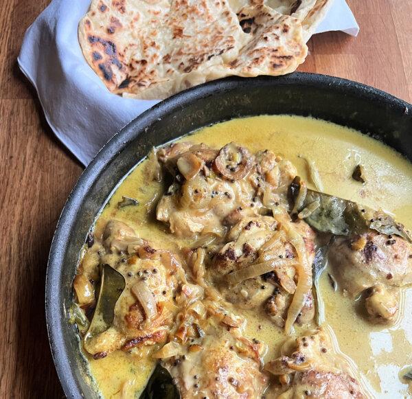 Served with homemade naan, this chicken curry is light on spices but heavy on taste. (Gretchen McKay/Pittsburgh Post-Gazette/TNS)