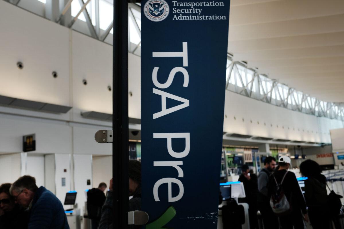Passengers wait in a Transportation Security Administration line at JFK airport in New York City on Jan. 9, 2019. (Spencer Platt/Getty Images)