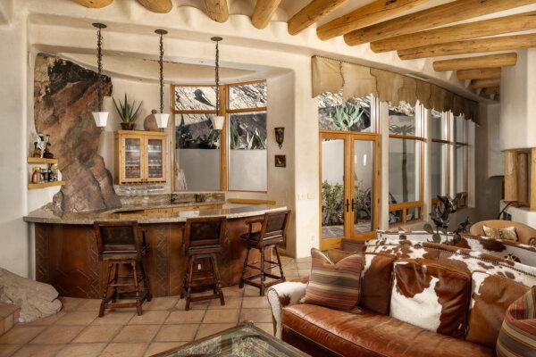 A boulder embedded in the wall in the wet bar. (Eric Kruk)