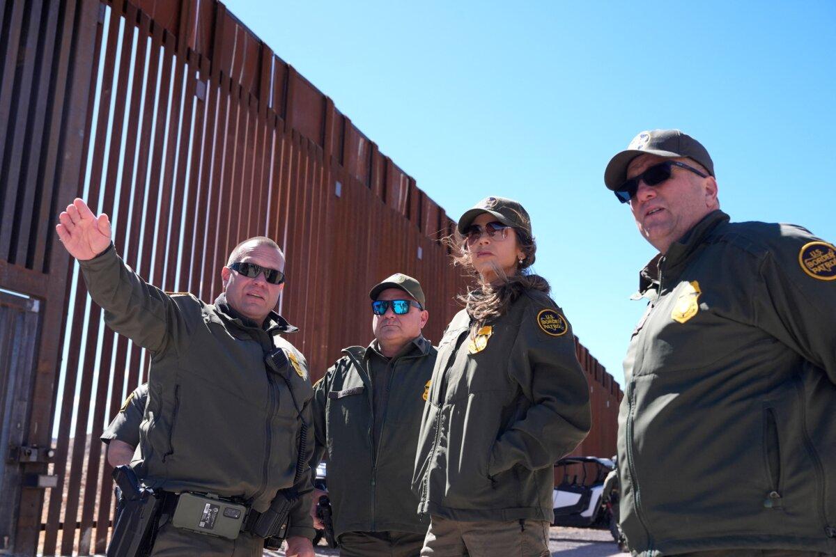 Illegal Border Crossings Hit Record Monthly Low, CBP Says | USNN World News Secretary of Homeland Security Kristi Noem (2nd R) during a tour along the Nogales border wall at the Mariposa Port of Entry in Nogales, Ariz., on March 15, 2025. (Alex Brandon/AFP via Getty Images)