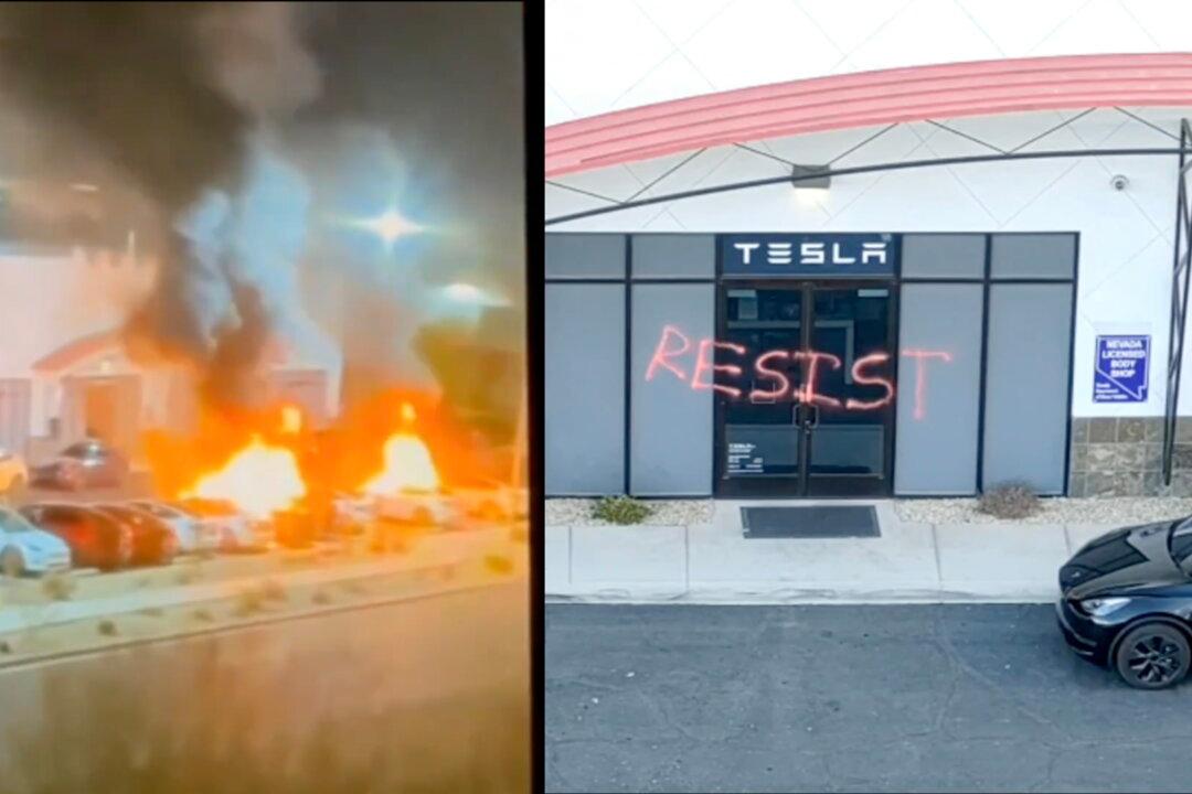 Teslas Shot and Set on Fire at Las Vegas Shop; ‘Resist’ Scrawled on Building