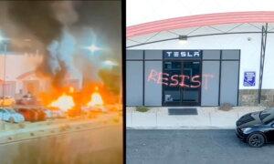 Xe Tesla bị bắn và đốt cháy tại cửa hàng ở Las Vegas; dòng chữ 'Resist' được viết nguệch ngoạc trên tòa nhà