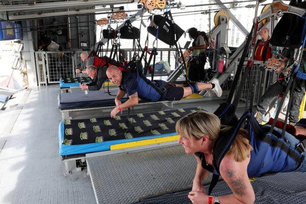 Guests ride the Super-Hero Zoom in "superhero style." (K.M. Cannon/Las Vegas Review-Journal/TNS)