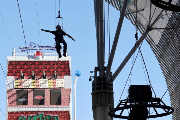 A person rides the Zip-Zilla zip line in a seated position. (K.M. Cannon/Las Vegas Review-Journal/TNS)