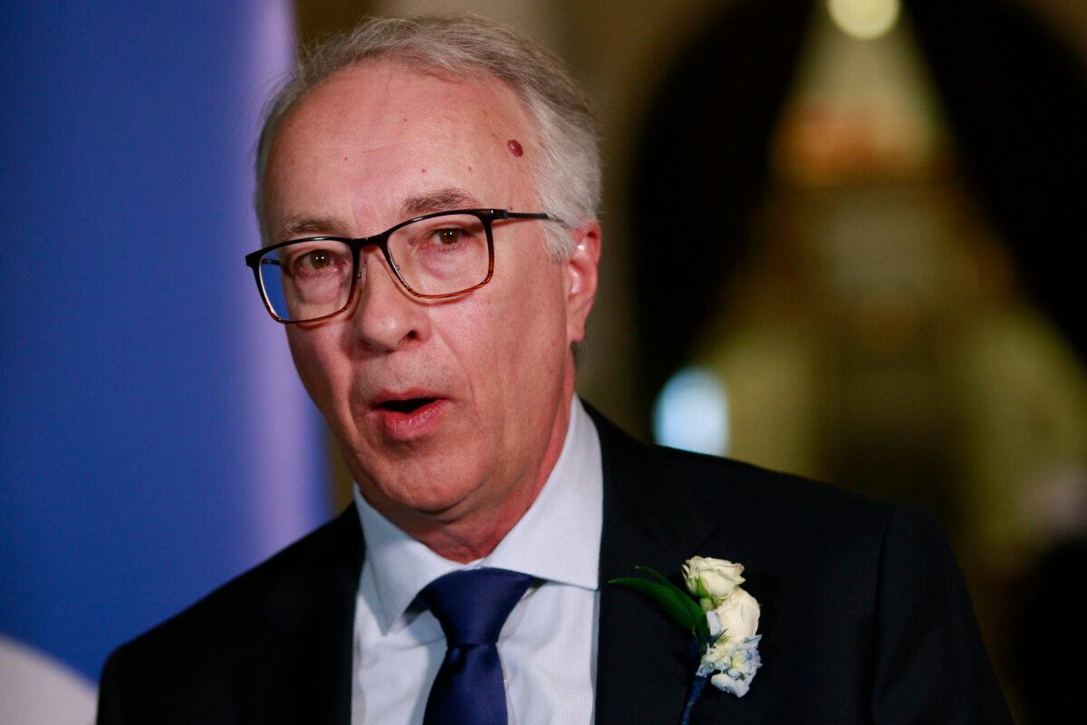 B.C. Conservative Leader John Rustad speaks to reporters following the throne speech at the legislature in Victoria, Feb. 18, 2025. (THE CANADIAN PRESS/Chad Hipolito)