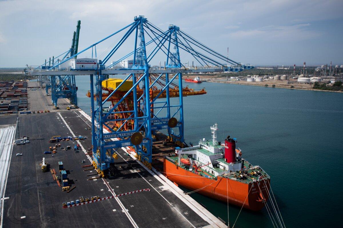 Two giant Malaccamax gantry cranes delivered by the Chinese company Shanghai Zhenhua Heavy Industries (ZMPC) at the Fos-Sur-Mer harbour, on the outskirts of Marseille, France, on July 23, 2020. (Clement Mahoudeau/AFP via Getty Images)