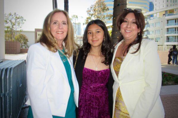 Lorenza Passarella (L) and her family members enjoyed Shen Yun at the Terrace Theater in Long Beach, California, on March 23, 2025. (Linda Jiang/The Epoch Times)