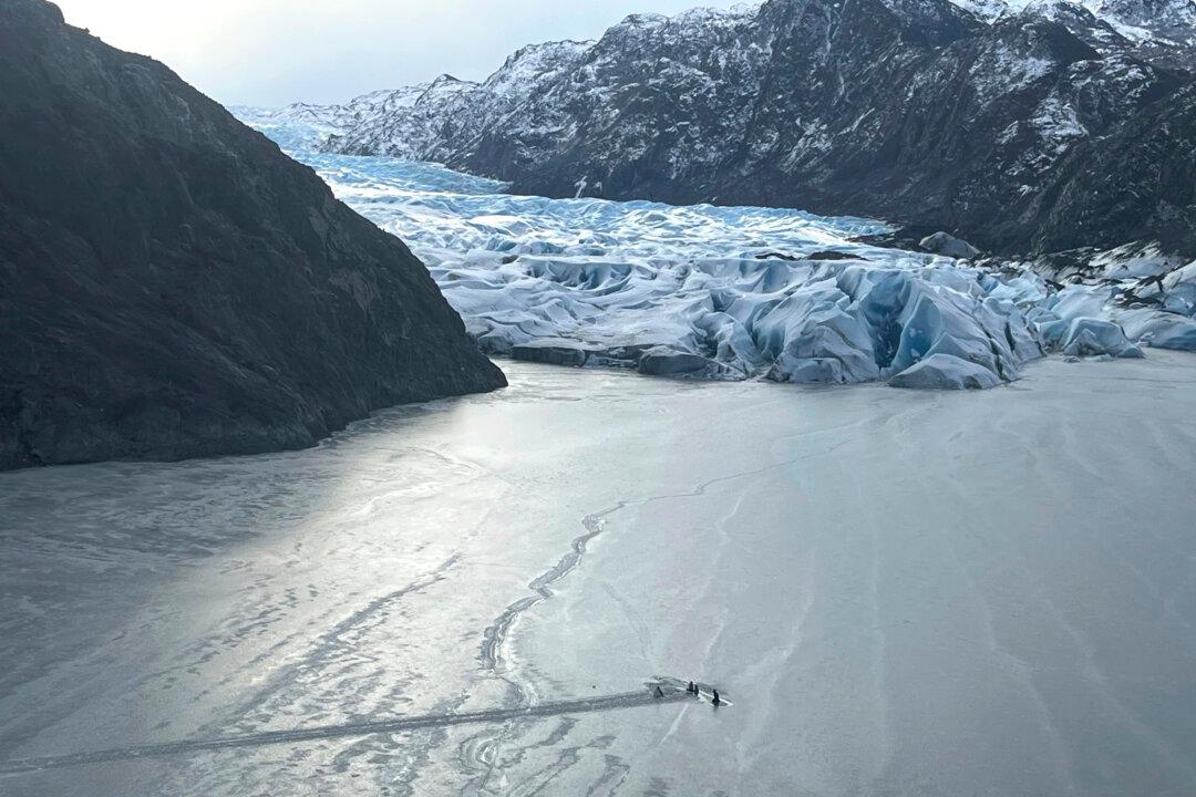 Pilot and 2 Young Daughters Survive the Night on Airplane Wing After Crashing Into Icy Alaska Lake