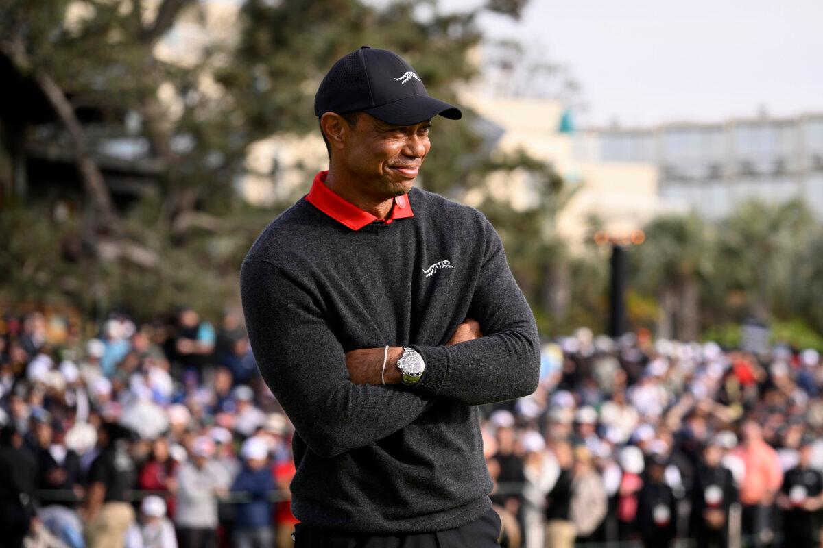 Tiger Woods looks on during the trophy ceremony after the final round of The Genesis Invitational 2025 at Torrey Pines Golf Course in La Jolla, Calif., on February 16, 2025. (Orlando Ramirez/Getty Images)