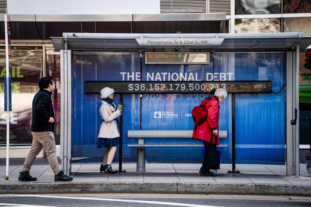 The national debt clock is displayed at a bus station in Washington on Jan. 2, 2025. (Madalina Vasiliu/The Epoch Times)