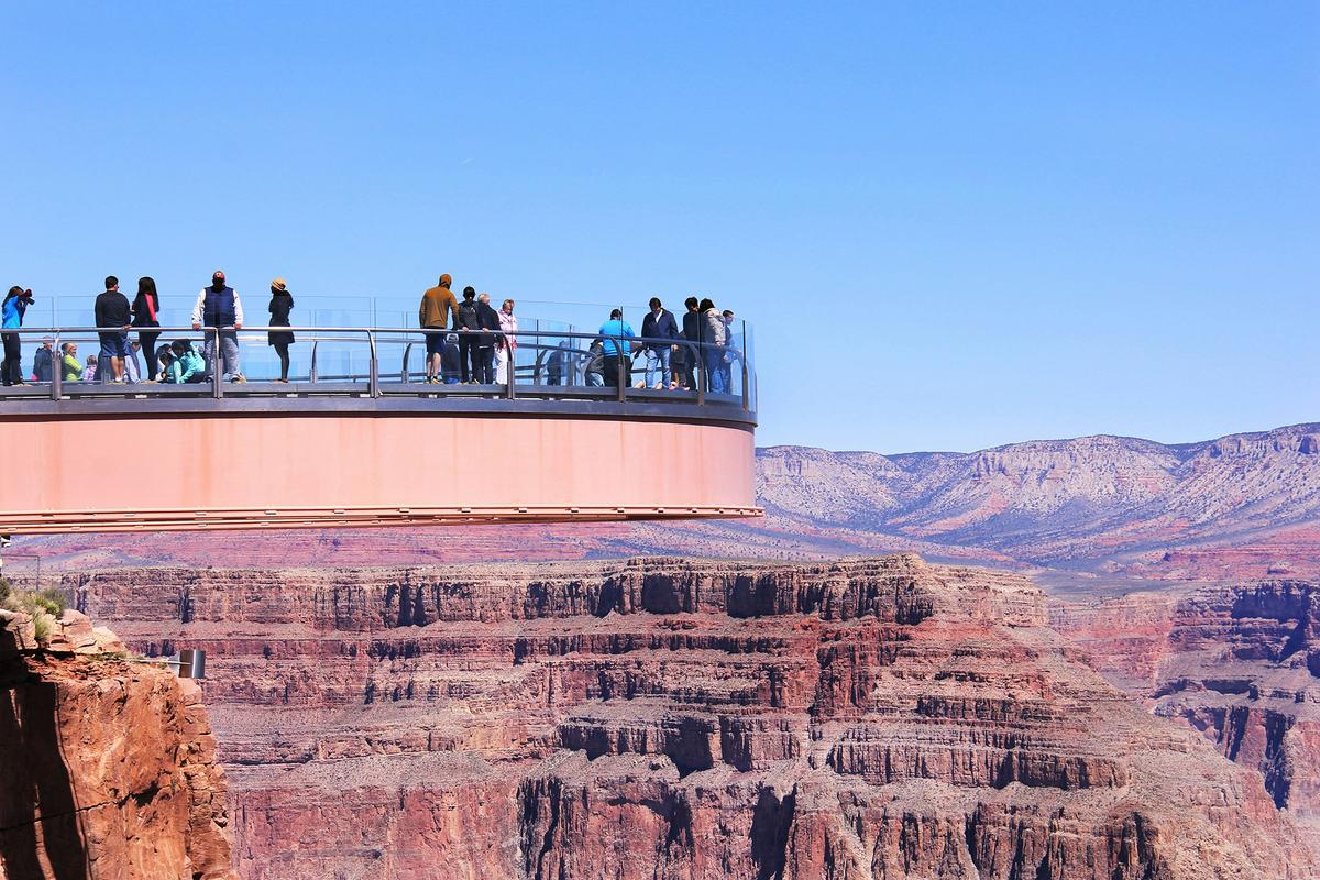 The Grand Canyon Skywalk, a glass-bottomed walkway, extends 70 feet over the canyon's edge. (Justin Wang/Unsplash)