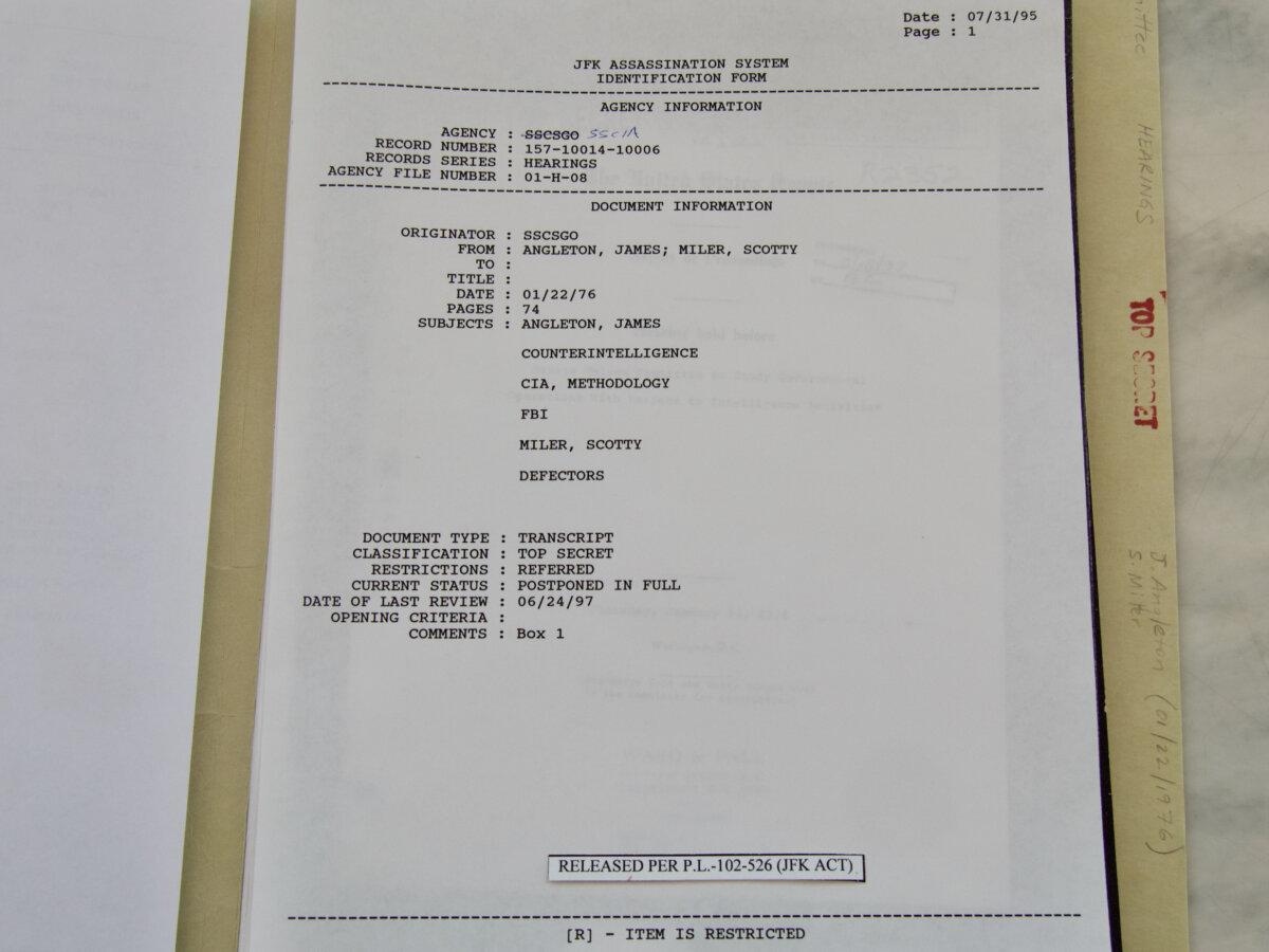 National Archives record identification sheet showing that the James Angleton transcript was previously withheld in full from the public. (Travis Gillmore/The Epoch Times)