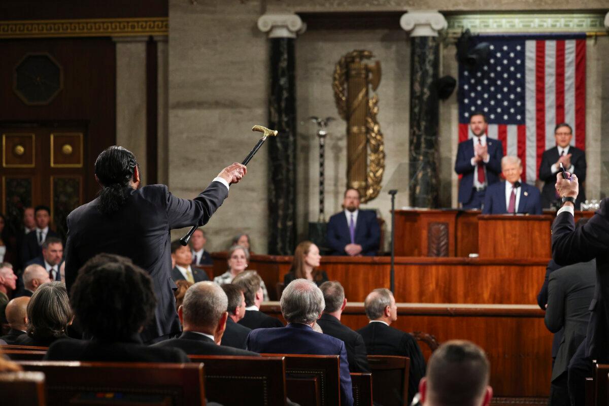 Rep. Al Green (D-Texas) (L) shouts as President Donald Trump addresses a joint session of Congress at the U.S. Capitol on March 4, 2025. (Win McNamee/Pool Photo via AP)