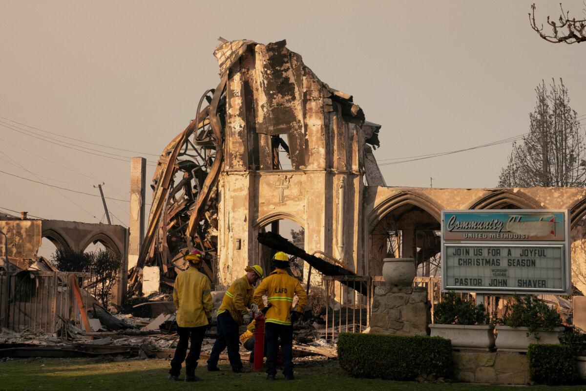 Firefighters work near a church destroyed in the Palisades Fire in Los Angeles on Jan. 10, 2025. (David Ryder/Reuters)