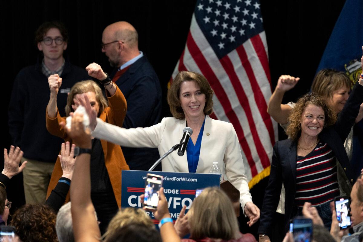 Dane County Circuit Court Judge Susan Crawford (C) will respond with supporters after winning the Wisconsin Supreme Court judicial race on April 1, 2025 at the election night event in Madison, Wisconsin. (Scott Olson/Getty Images)