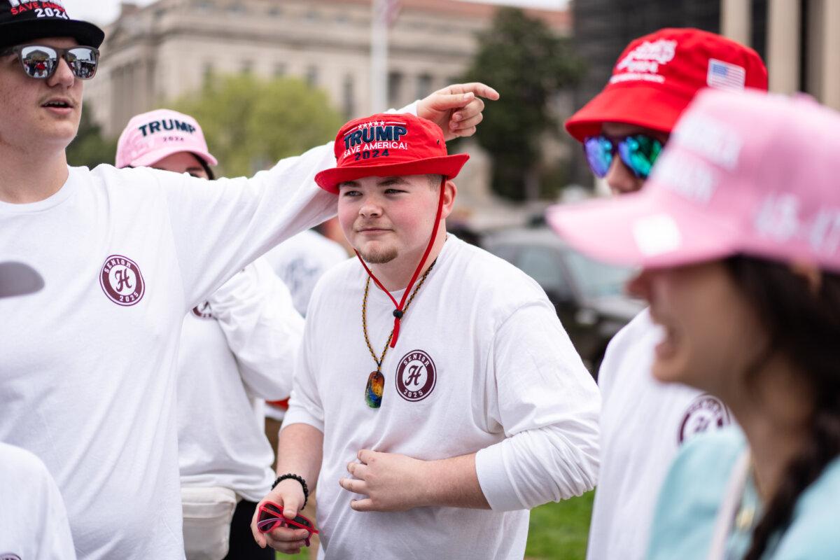 A group of high schoolers visit Washington during a protest against President Donald Trump on April 5, 2025. (Madalina Vasiliu/The Epoch Times)