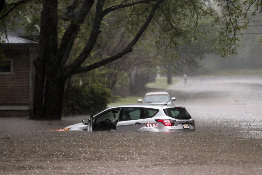 At Least 18 Dead as Flooding, Tornadoes Rip Across South and Midwest