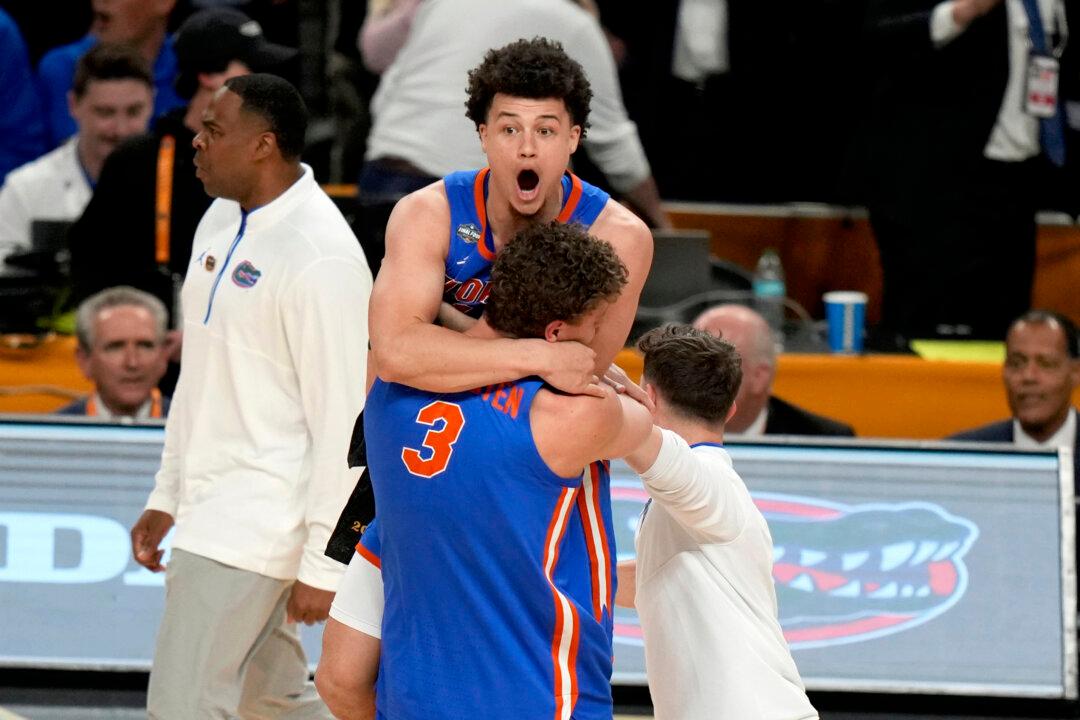 Florida Wins Its 3rd National Title and Denies Houston Its 1st, Rallying for 65–63 Victory
