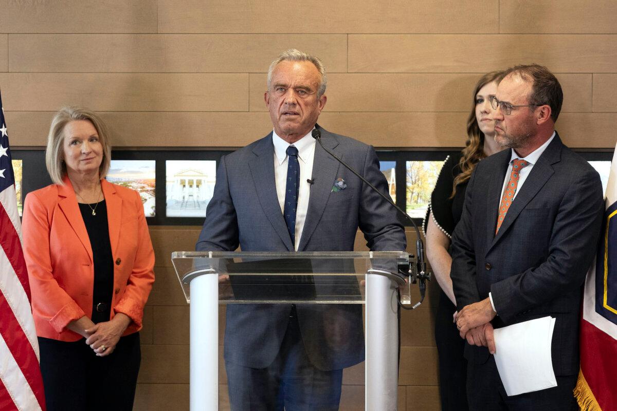 Health and Human Services Secretary Robert F. Kennedy Jr., center, speaks during a press conference about Utah's new fluoride ban, food additives, and SNAP funds legislation in Salt Lake City on April 7, 2025. (Melissa Majchrzak/AP Photo)