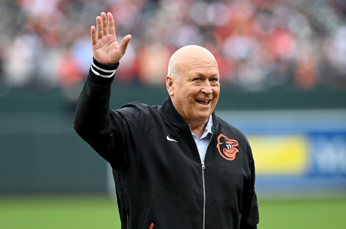 Former Baltimore Oriole Cal Ripken Jr. waves to the crowd before the game between the Baltimore Orioles and the Los Angeles Angels on Opening Day at Oriole Park at Camden Yards in Baltimore, Maryland, on March 28, 2024. (Greg Fiume/Getty Images)