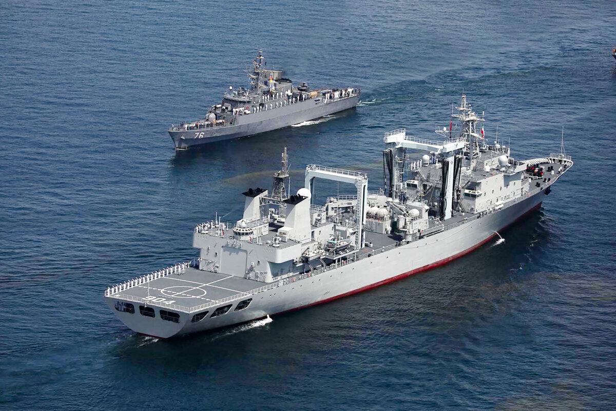 Navy vessels taking part in a joint Iranian–Russian–Chinese military drill in the Gulf of Oman on March 12, 2025. (Iranian Army Office/AFP via Getty Images)