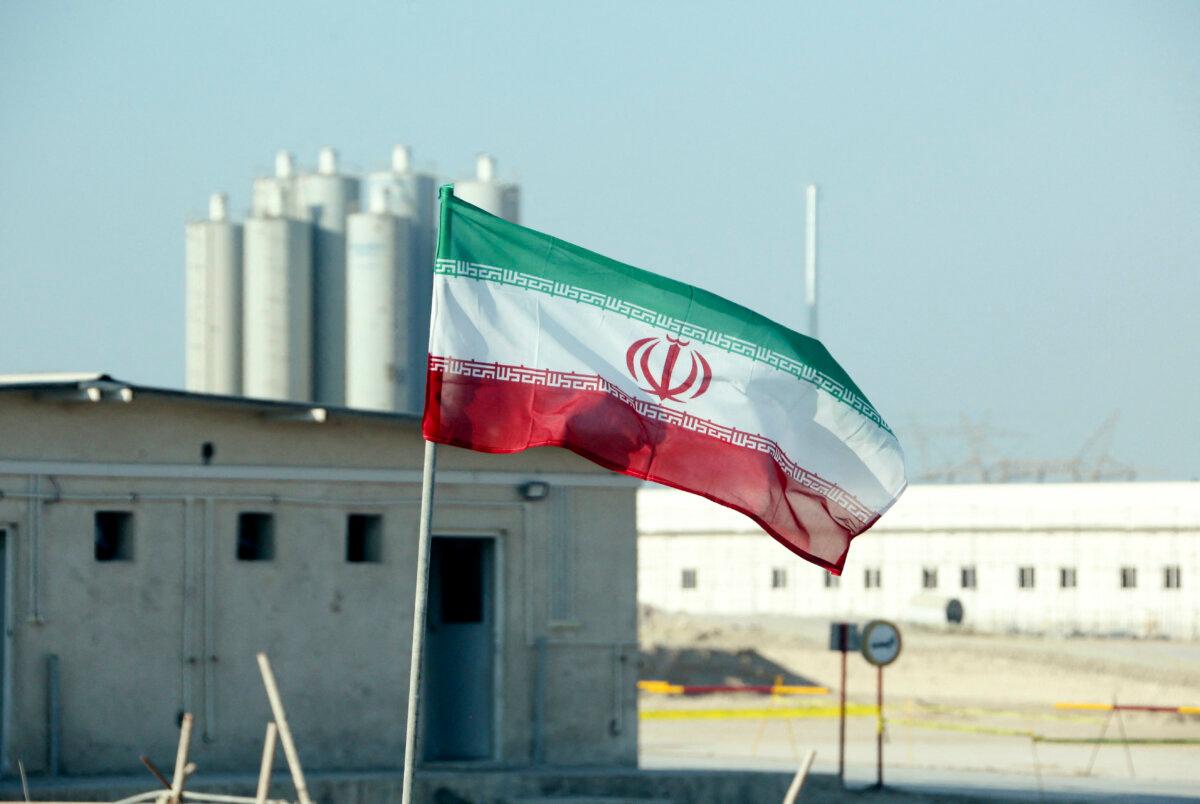 An Iranian flag at Iran's Bushehr nuclear power plant during an official ceremony to kickstart work on a second reactor at the nuclear power station on Nov. 10, 2019. (Atta Kenare/AFP via Getty Images)