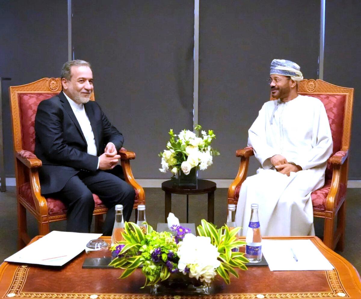 Iranian Foreign Minister Abbas Araghchi (L) meets his Omani counterpart Sayyid Badr Albusaidi prior to negotiations with U.S. Mideast envoy Steve Witkoff in Muscat, Oman, on April 12, 2025. (Iranian Foreign Ministry via AP)